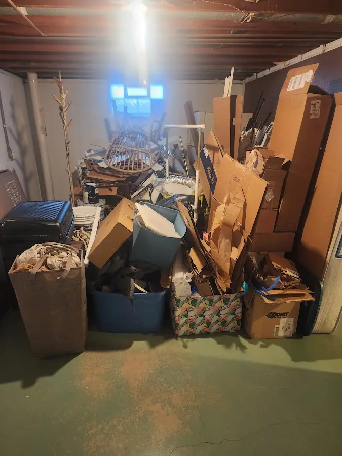 Roll-off dumpster container at job site for Yard Waste Dumpster Rental in Paris